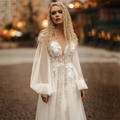 Modern A-line V-neck puff sleeve backless lace tulle sweep train bridal gown detail