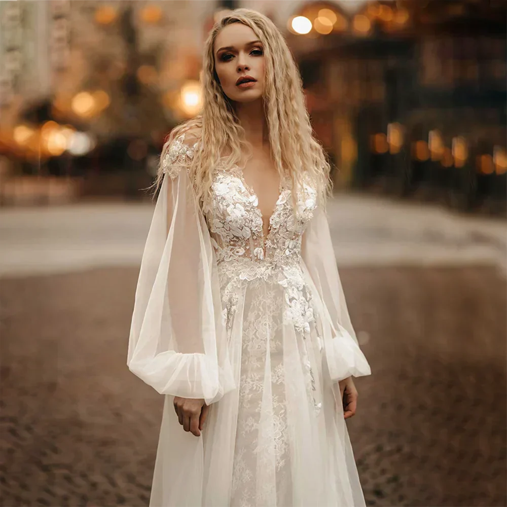 Modern A-line V-neck puff sleeve backless lace tulle sweep train bridal gown detail