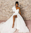 Single shoulder puff sleeve V-neck A-line beach side split big bow bridal dress front view