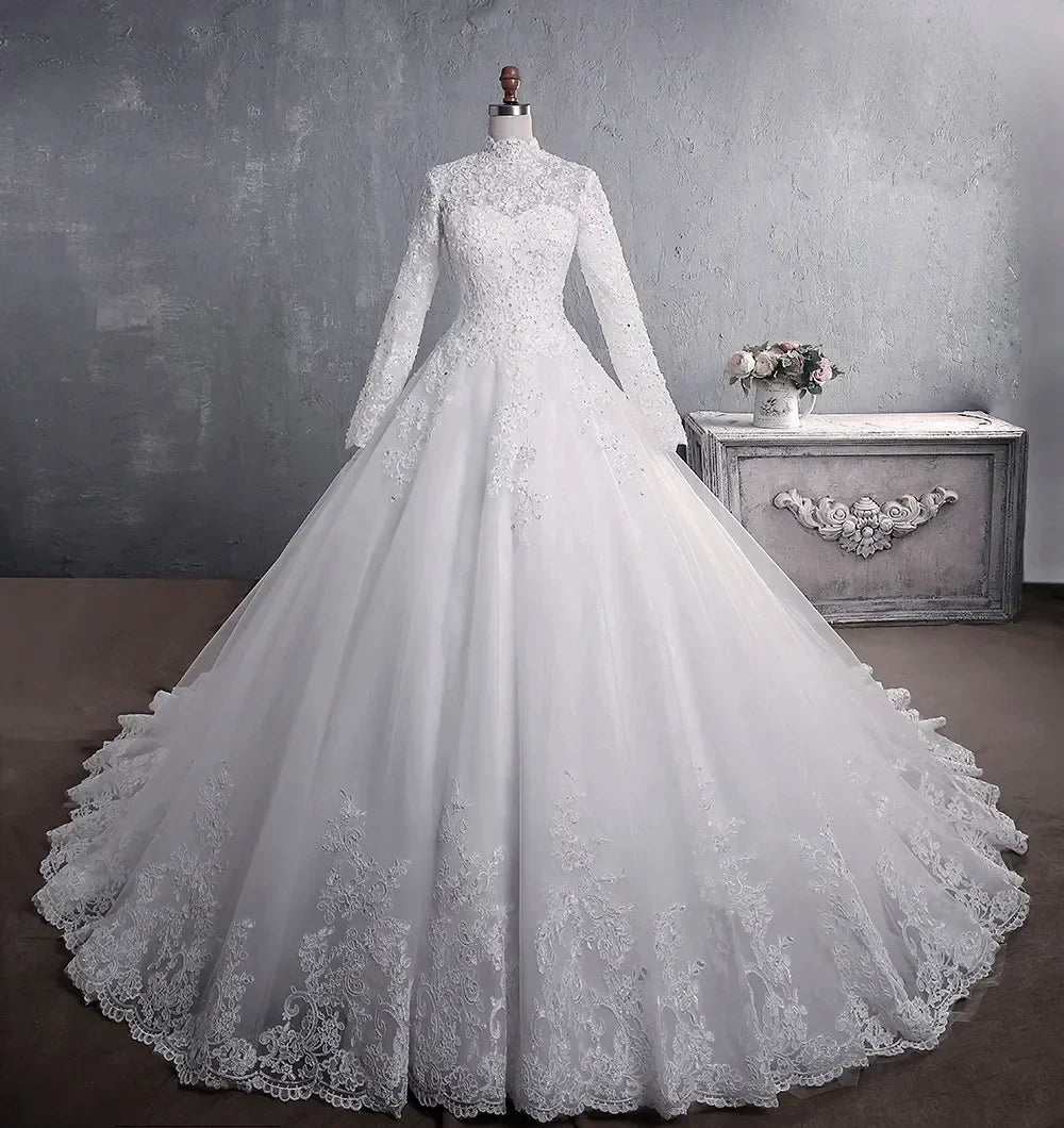 Modest wedding dress 2026 lace beads long sleeves high neck with train princess A-line bridal gown