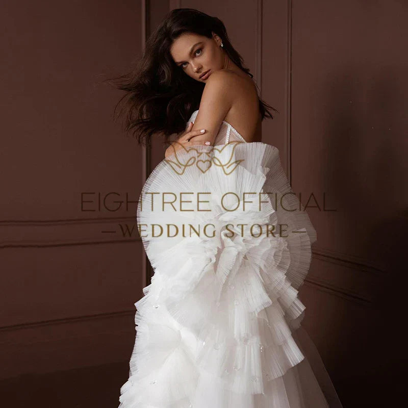White elegant princess tulle A-line bridal gown boho beach wedding front view