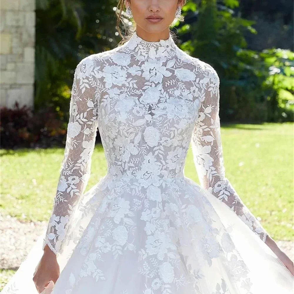 Luxury high neck lace appliques long sleeves illusion button ball gown bridal gown front view
