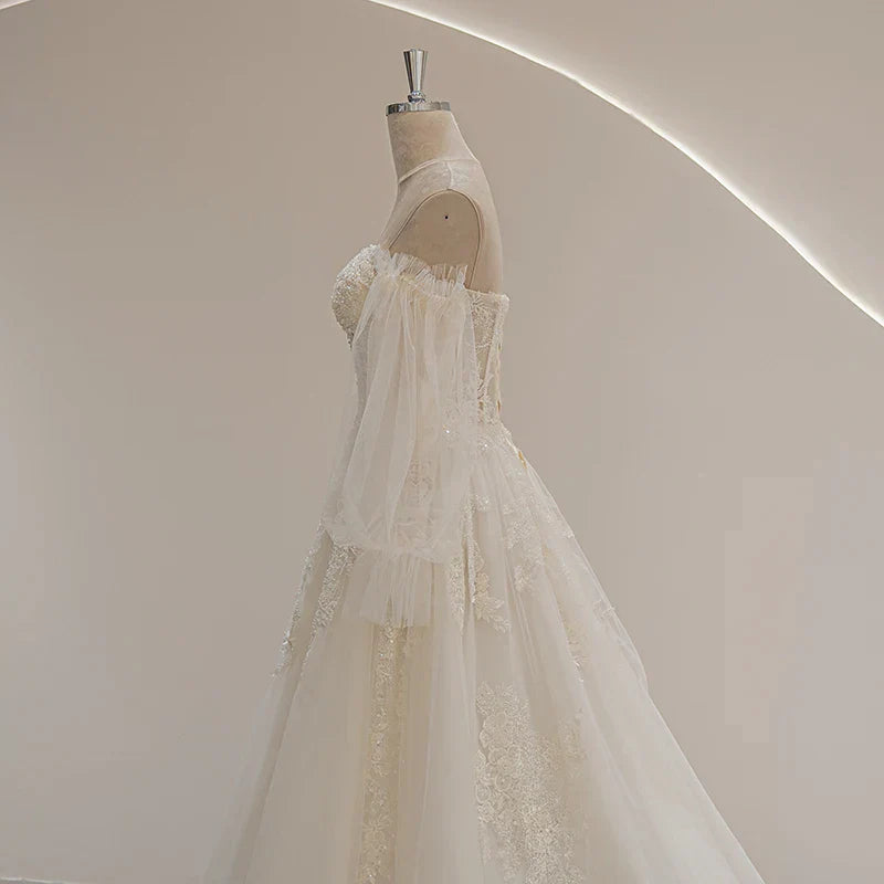 Romantic puff bohemian lace sweetheart long sleeve beading appliques bridal gown close-up