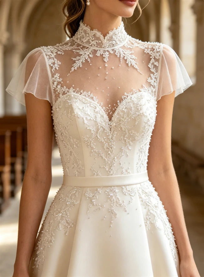 High neck pearl pleat short sleeve wedding dress – front view – Snowy Bridal