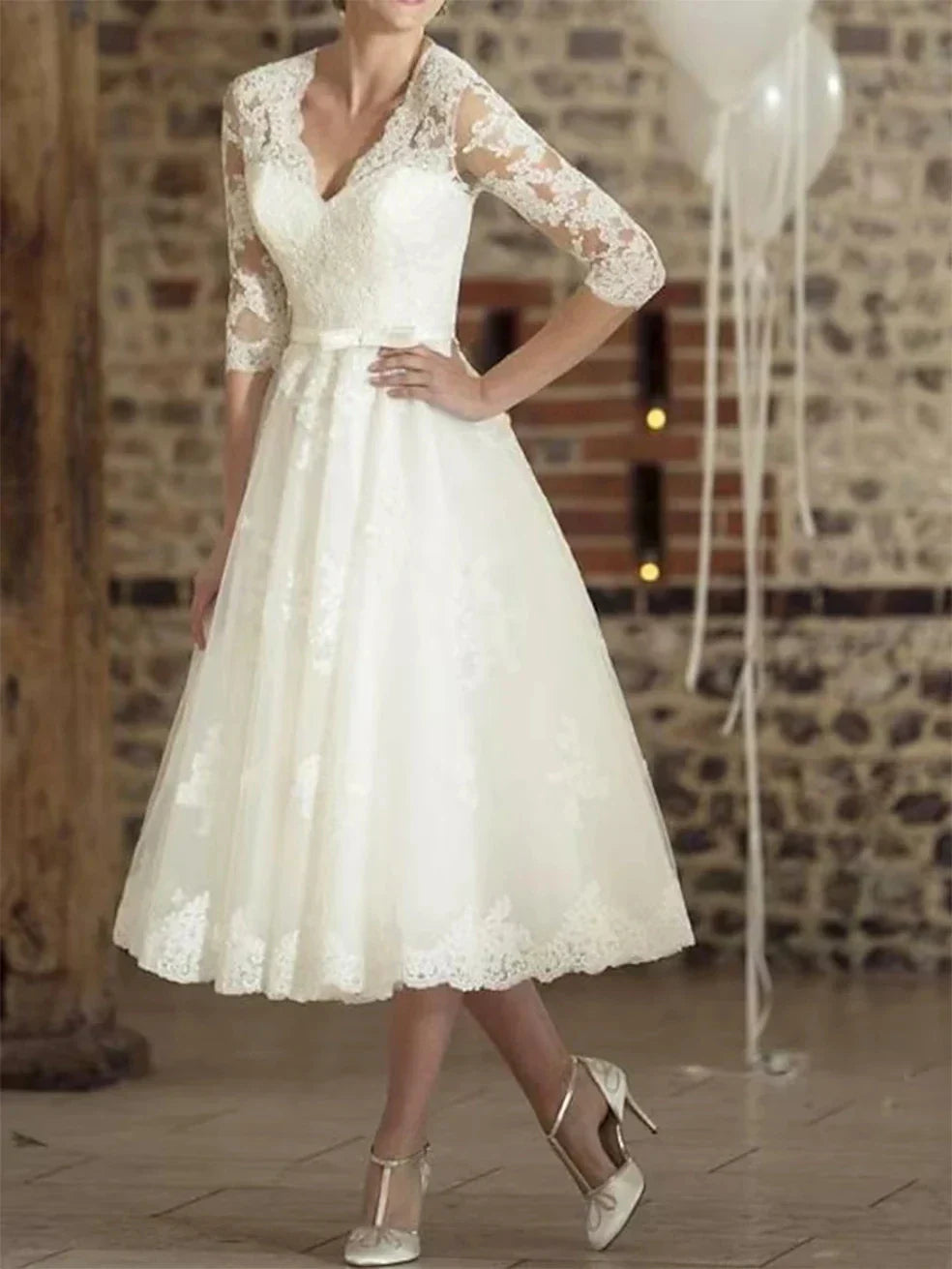 Vintage A-line wedding dress 1940s style V-neck tea-length lace covered button bridal gown