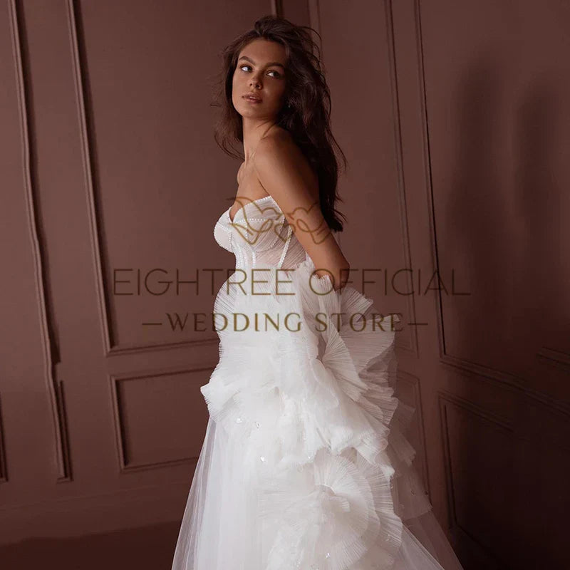 White elegant princess tulle A-line bridal gown boho beach wedding front view
