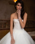 Strapless elegant sleeveless sexy A-line stylish tulle sweep train bridal gown side view