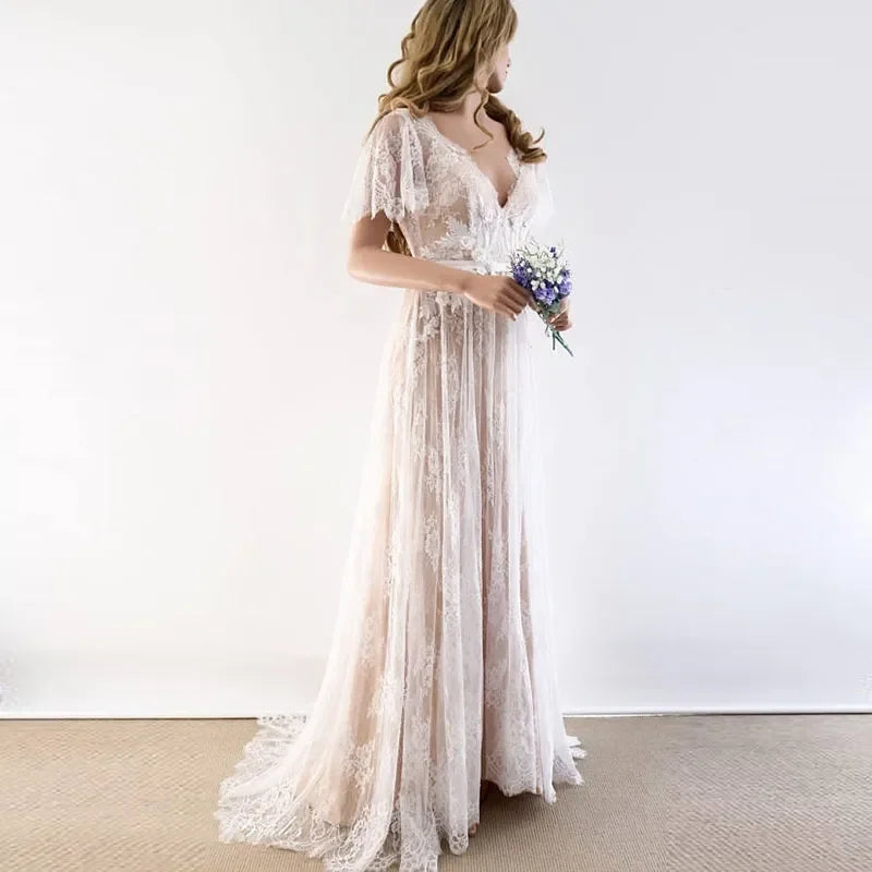 New boho wedding dress 2026 V-neck cap sleeve lace beach backless bridal gown