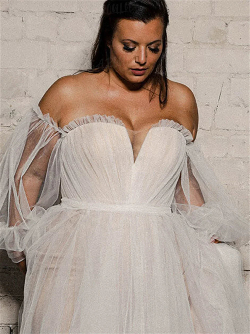 Long puff sleeves beach A-line plus size sweep train bride wedding dress bridal gown side view