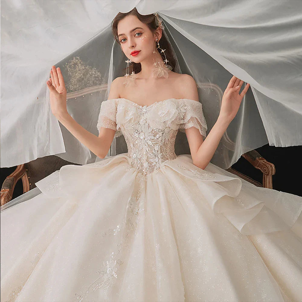 Crystal beading sparkly off-shoulder lace-up short sleeve princess long train ball gown side view