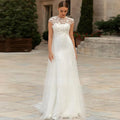 Satin 3D flowers cap sleeve O-neck sweetheart cut-out back tulle overskirt bridal gown close-up
