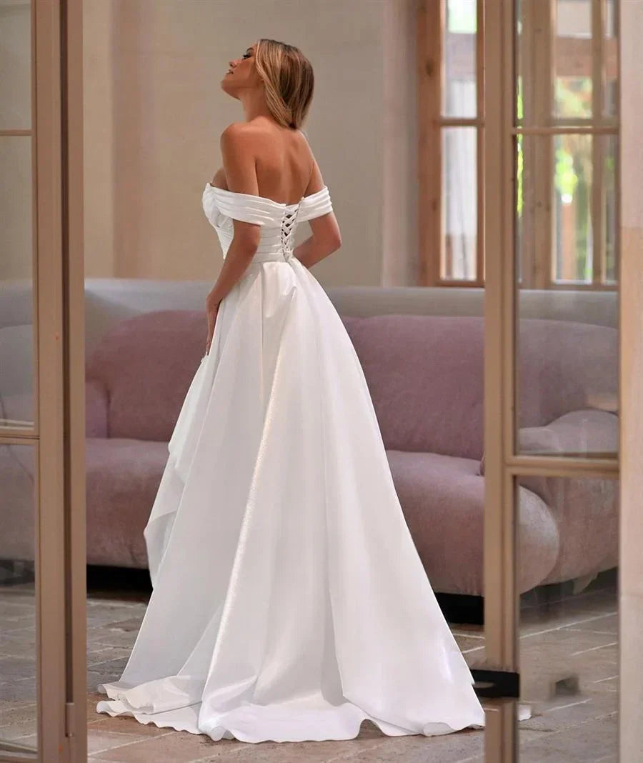 Matte satin off-shoulder crisscross ruched high slit wedding dress side view