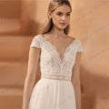 Sexy elegant deep V-neck short sleeves high slit lace fascinating wedding dress bridal gown back view