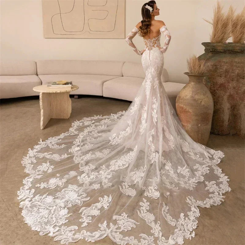 Mermaid luxury lace sweetheart long sleeve open back court train bridal gown back view