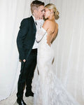 Off-shoulder long sleeve full lace mermaid beach backless elegant bridal gown back view