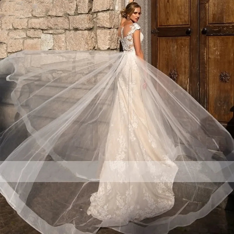 Illusion train boho cap sleeve sheath tulle lace button appliques wedding dress bridal gown back view