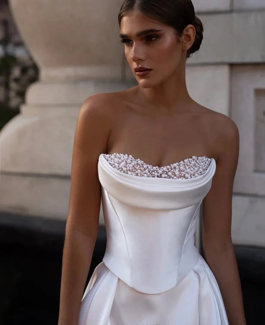 Two-piece satin A-line 2026 sweetheart pearls high slit long train bridal gown side view