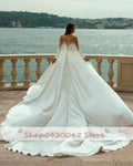 Front split sheer neck pearls appliques glamorous jewel overskirts custom made wedding dress ivory