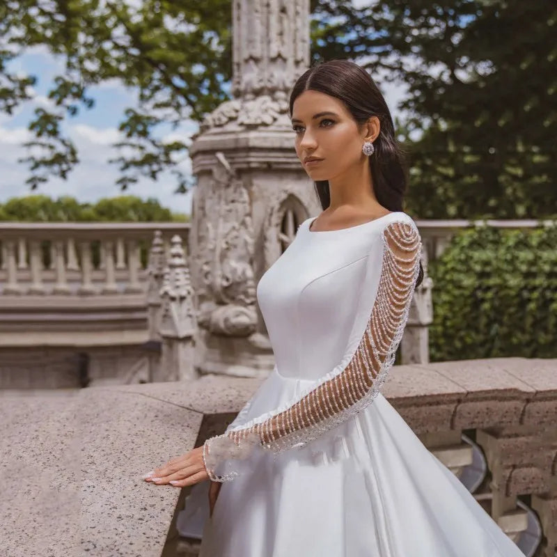 Full sleeve boat neck simple satin vintage button elegant beading A-line custom made wedding dress side view