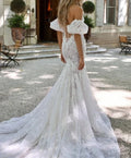Strapless illusion lace romantic mermaid court train custom bridal gown side view