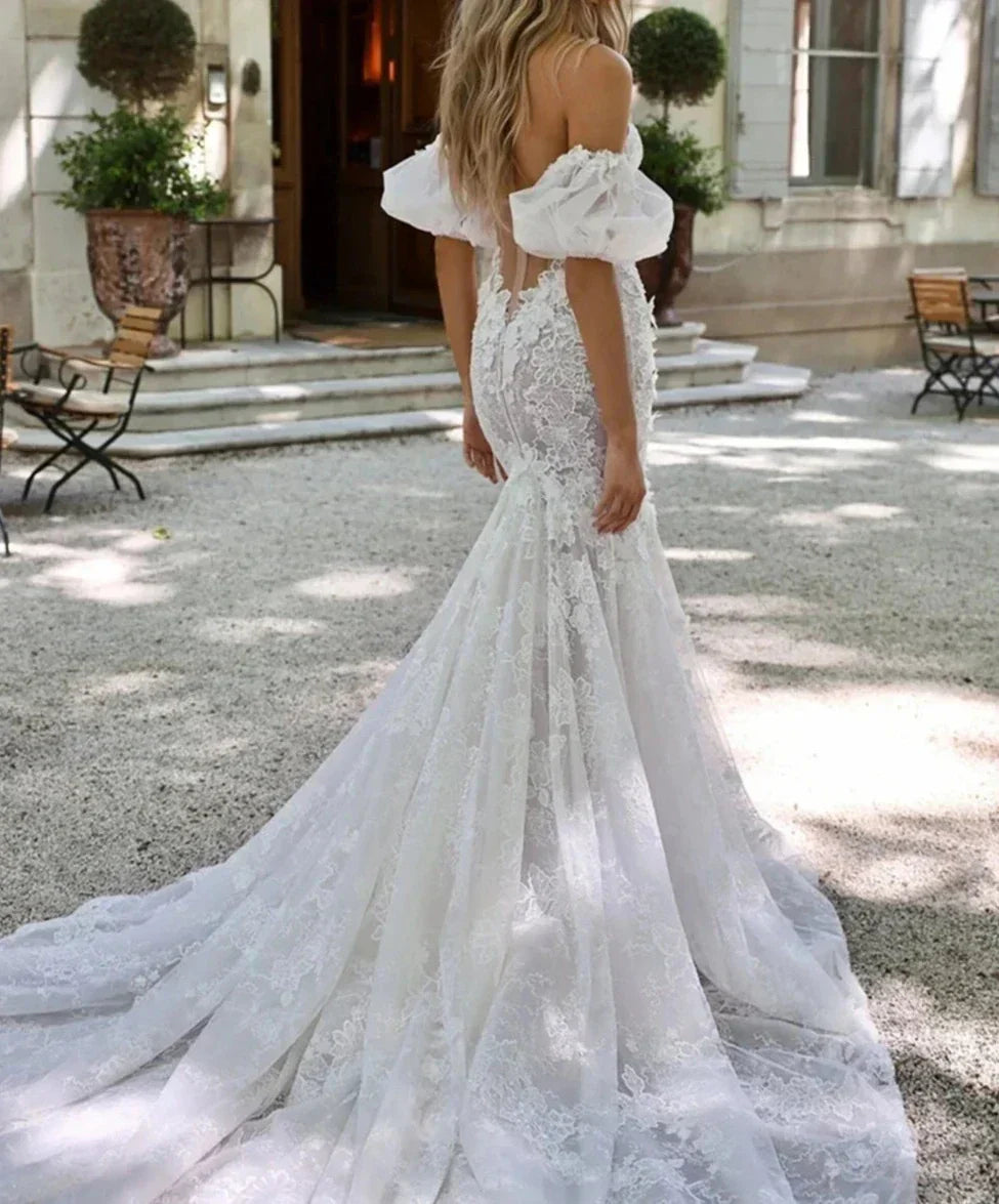Strapless illusion lace romantic mermaid court train custom bridal gown side view