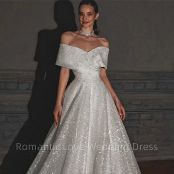 Vintage glitter off-shoulder V-neck A-line backless sparkly princess bridal gown front view