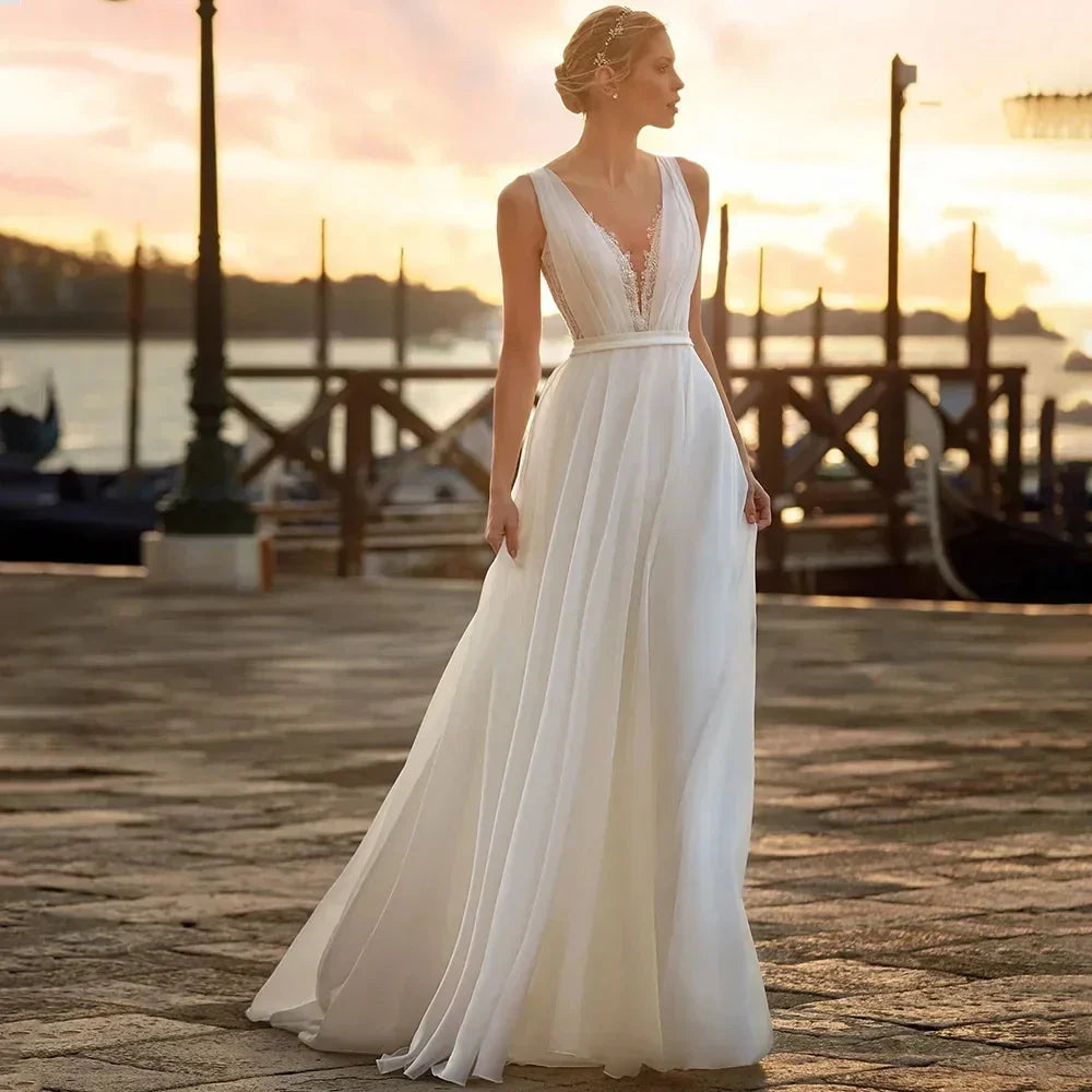 Elegant lace boho wedding dress V-neck chiffon A-line sleeveless lace appliques long bridal gown