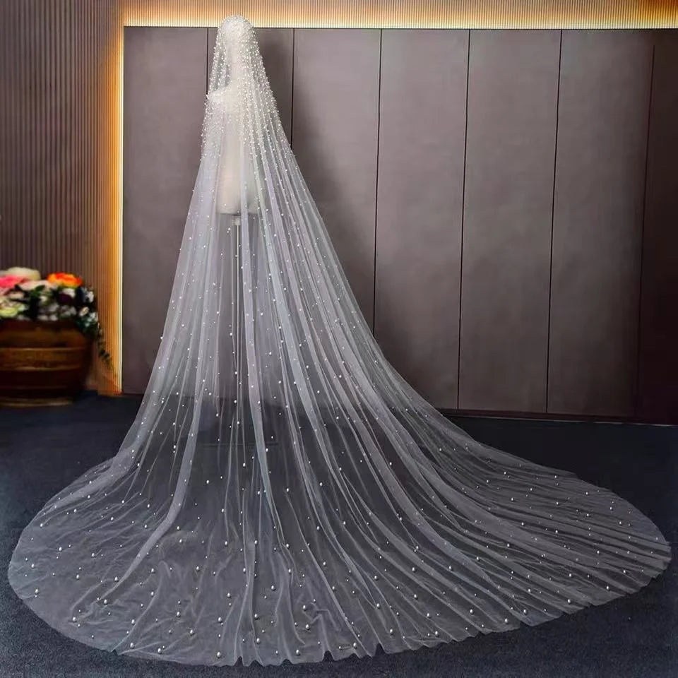 Ivory tulle handcrafted custom bridal veil designer cathedral wedding veil close-up