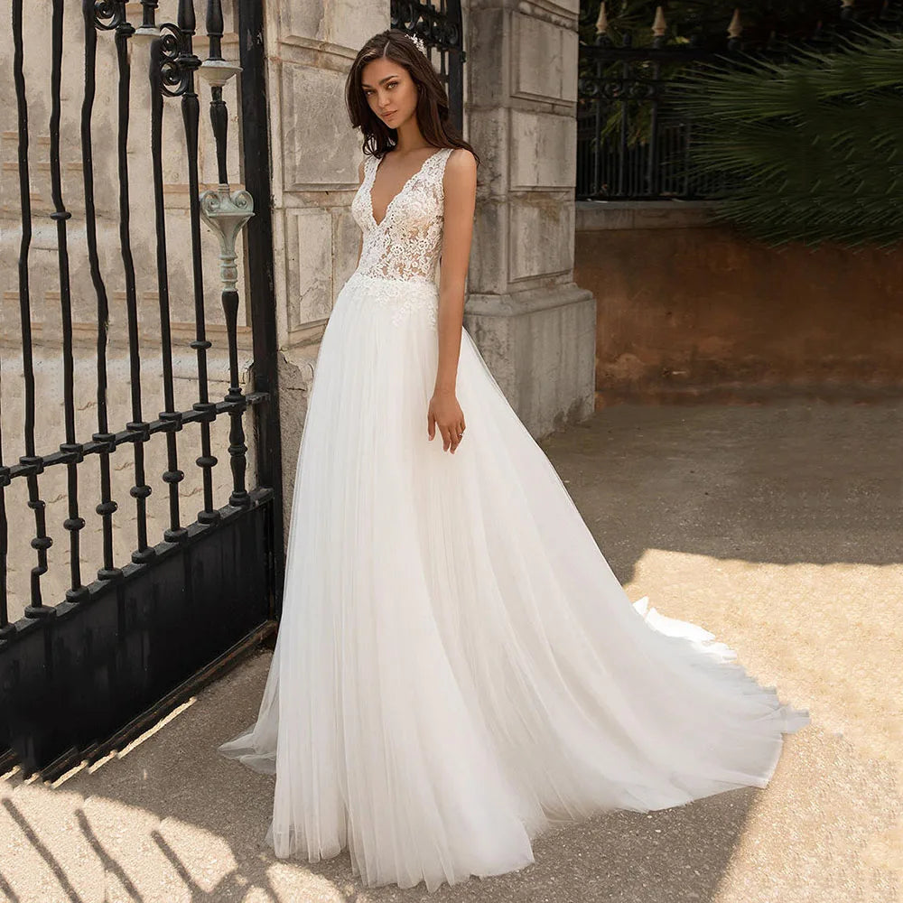 Customized Boho Wedding Dresses A Line V Neck Tulle Backless Bridal Gown Sleeveless Lace Appliques Formal Wedding Gowns