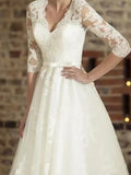 Tea-length lace formal - side angle