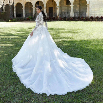 Luxury high neck lace appliques long sleeves illusion button ball gown bridal gown front view