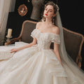 Princess long train ball gown off-shoulder crystal beading sparkly lace-up short sleeve wedding dress back