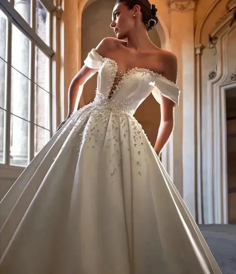 Luxury princess ball gown wedding dress sweetheart backless pearls beads long train satin bridal gown