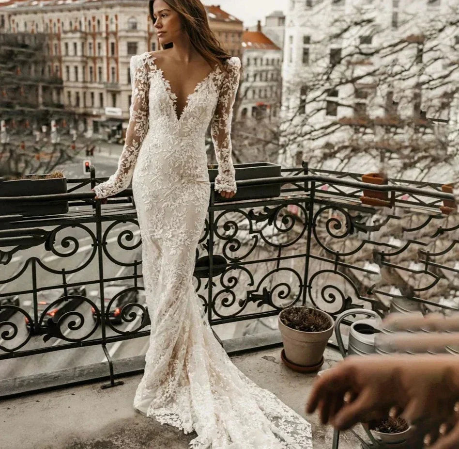 Classy mermaid lace appliques off-shoulder long sleeve backless bridal gown front view