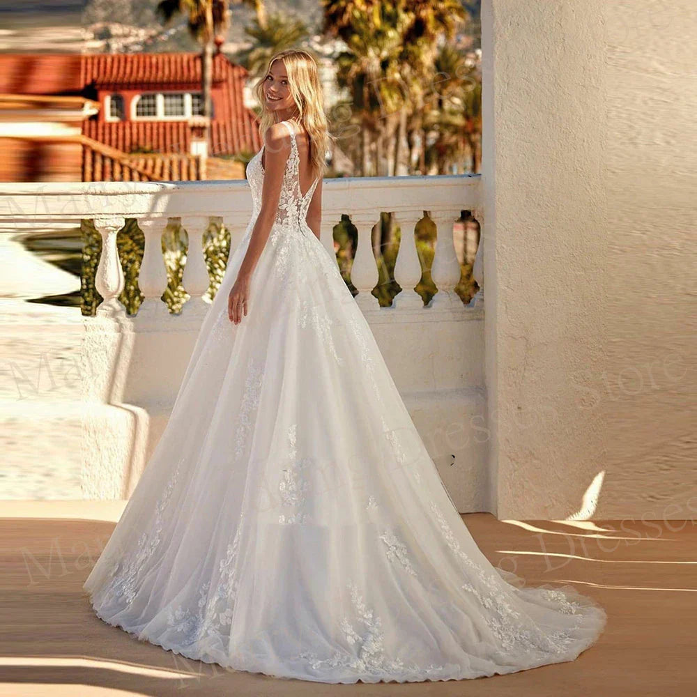 Fascinating A-line lace V-neck backless sleeveless tulle bridal gown front view