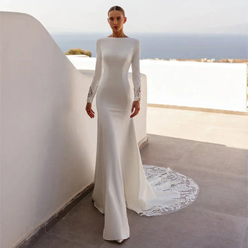 Luxury mermaid wedding dress 2026 boat neck long sleeves illusion back buttons sequined lace bridal gown