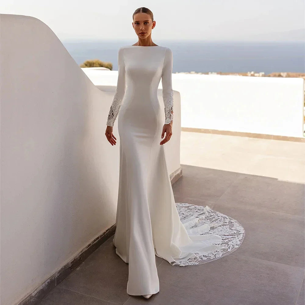 Luxury Mermaid Wedding Dress 2026 Boat Neck Long Sleeves Illusion Back Buttons Sequined Lace Applique Bride Bridal Gowns
