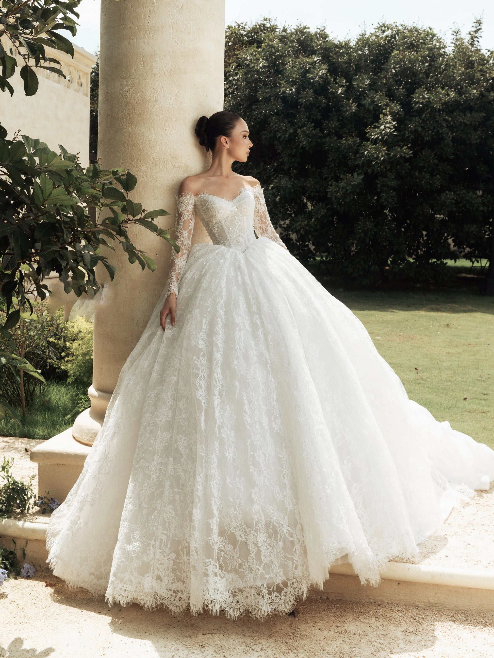 Off-shoulder long sleeve A-line lace wedding dress – back view – Snowy Bridal