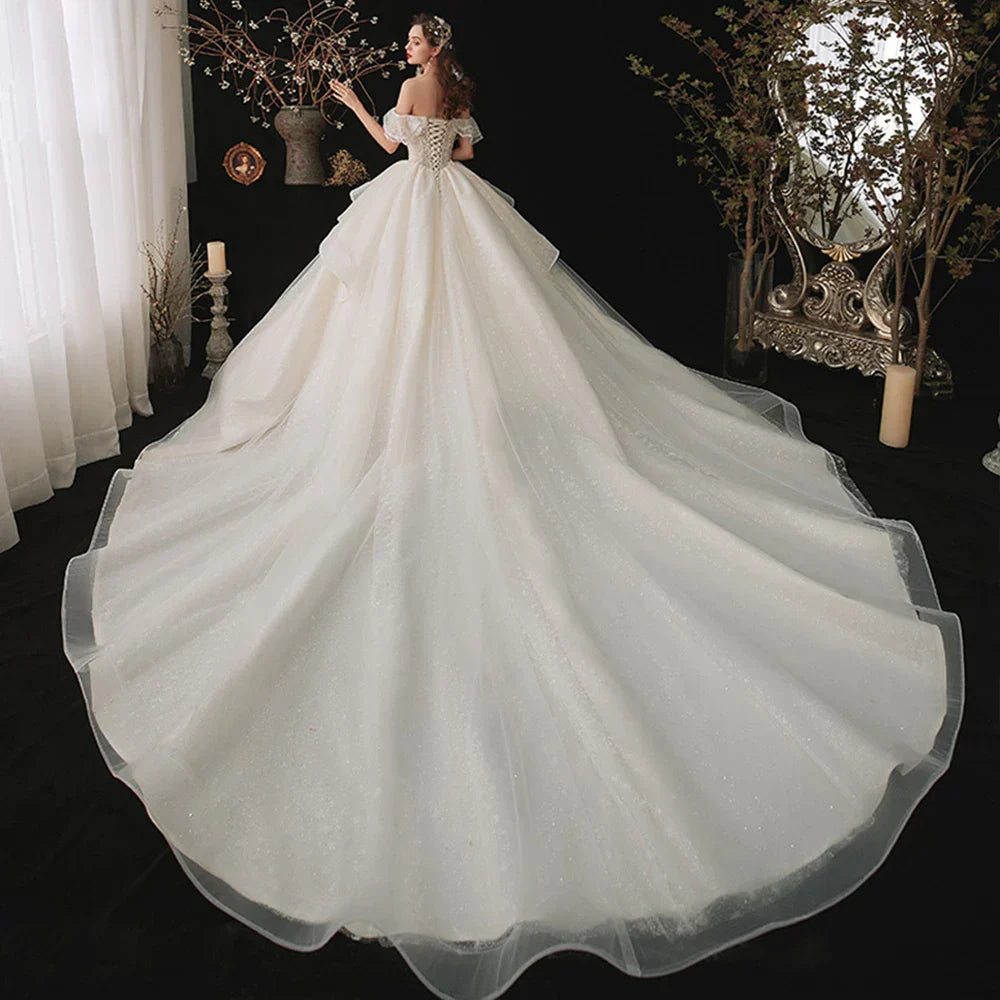 Off-shoulder short sleeve lace-up sparkly beading crystal princess ball gown wedding dress long train