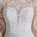 Autumn mermaid lace O-neck long sleeve elegant button back bridal gown close-up
