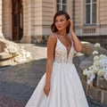 Lace V-neck elegant white women bridal wedding ceremony gown side view