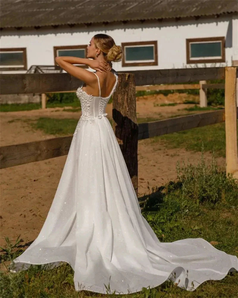 Romantic backless off-shoulder beautiful beach long sleeves high split lace mopping bridal gown back view
