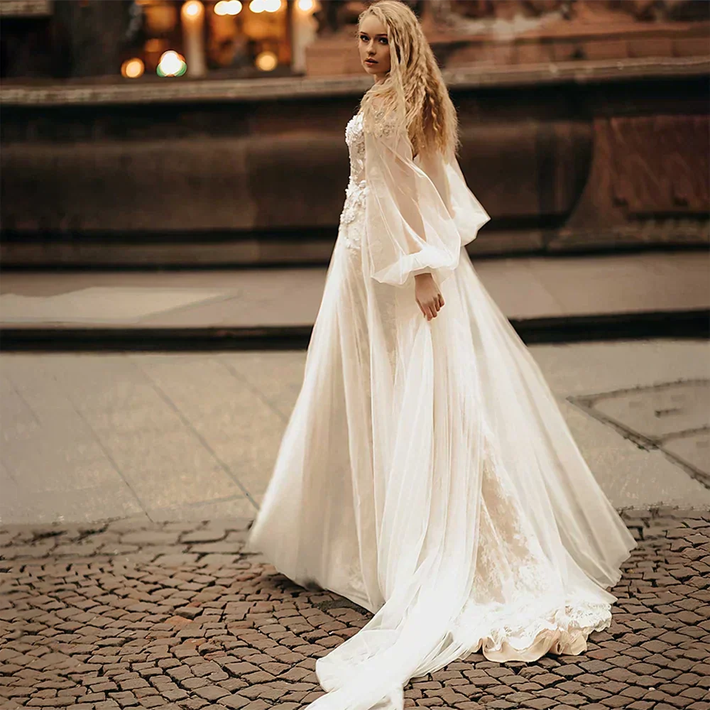 V-neck puff sleeve A-line lace backless modern bride tulle sweep train bridal gown front view