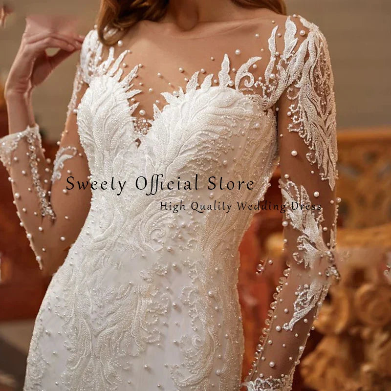 Detachable train O-neck full sleeve beading mermaid bridal gown detail