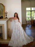 Strapless A-line lace wedding dress with puff sleeves – side view – Snowy Bridal