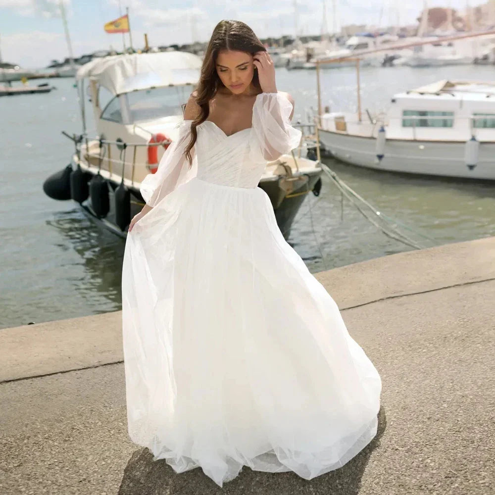 Elegant wedding dress 2026 strapless puff sleeves open back floor length tulle A-line beach bridal gown