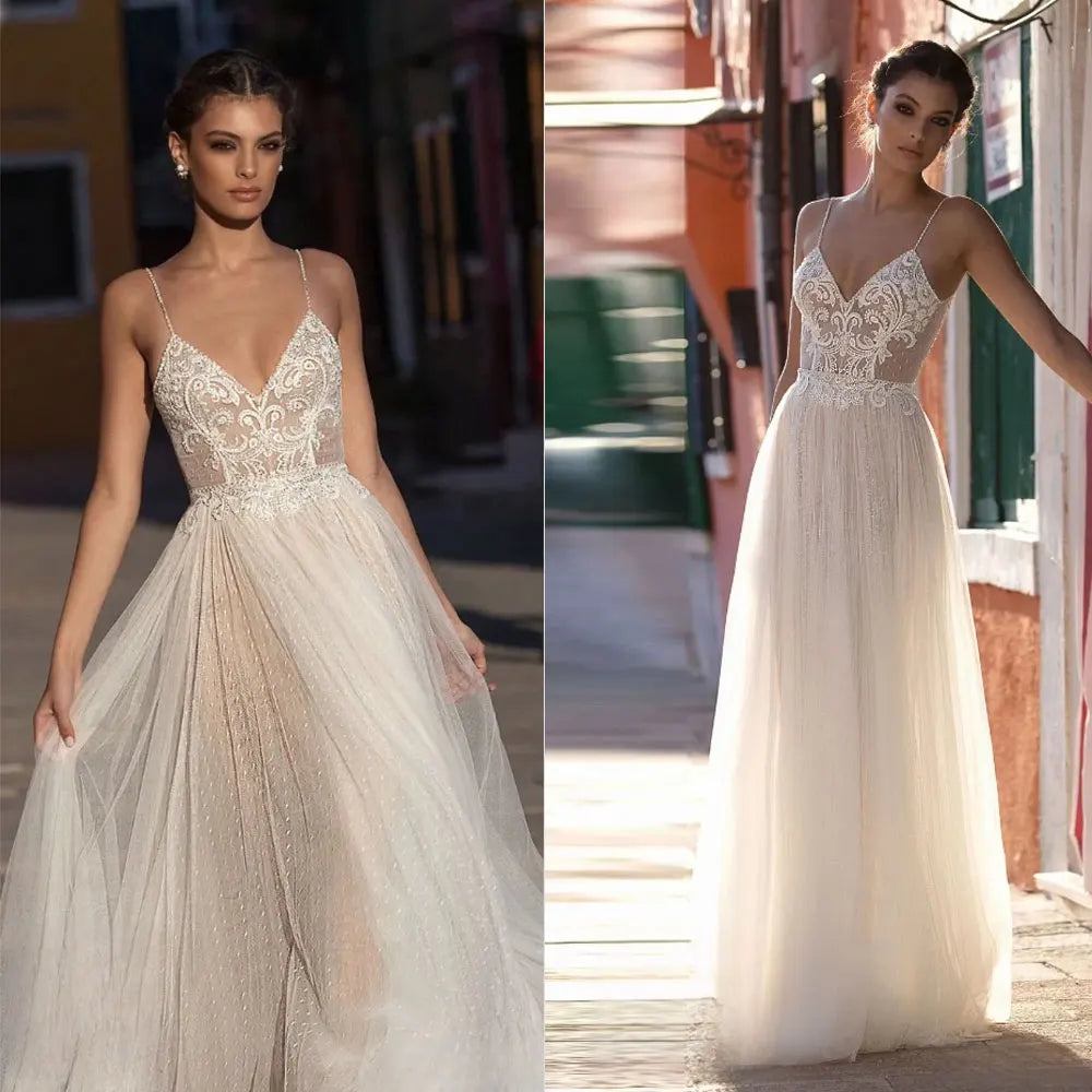 Simple white yarn A-line spaghetti strap sweep train lace illusion beach bridal gown front view