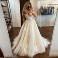 A-line tulle off-shoulder bohemian lace applique elegant bride bridal gown side view