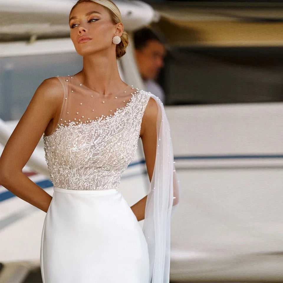 Sleeveless lace sequins beads chiffon O-neck sweep train button A-line bridal cape front view