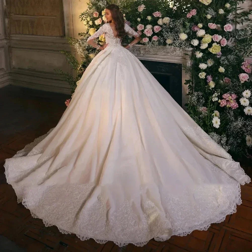 Vintage A-line wedding dress 2026 V-neck long sleeves illusion back buttons lace applique church bridal gown